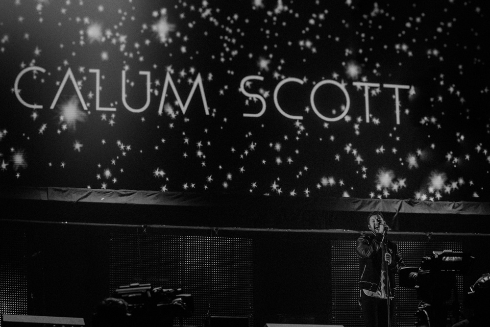Calum Scott singing at the Liverpool Echo Arena
